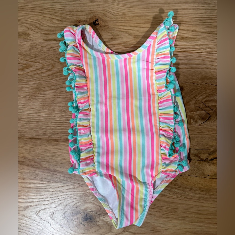 Girls Rainbow Stripe Ruffle One-Piece Swimsuit with Aqua Pom Trim 4T